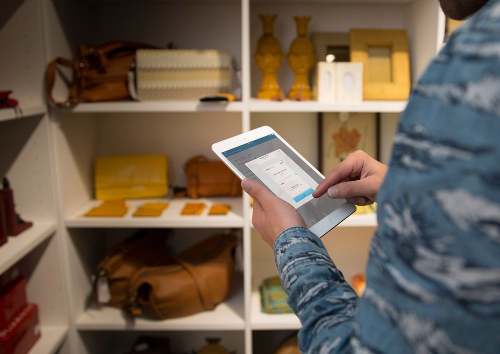 Man Browsing Through An Accounting App — Accounting Services in Coffs Harbour, NSW