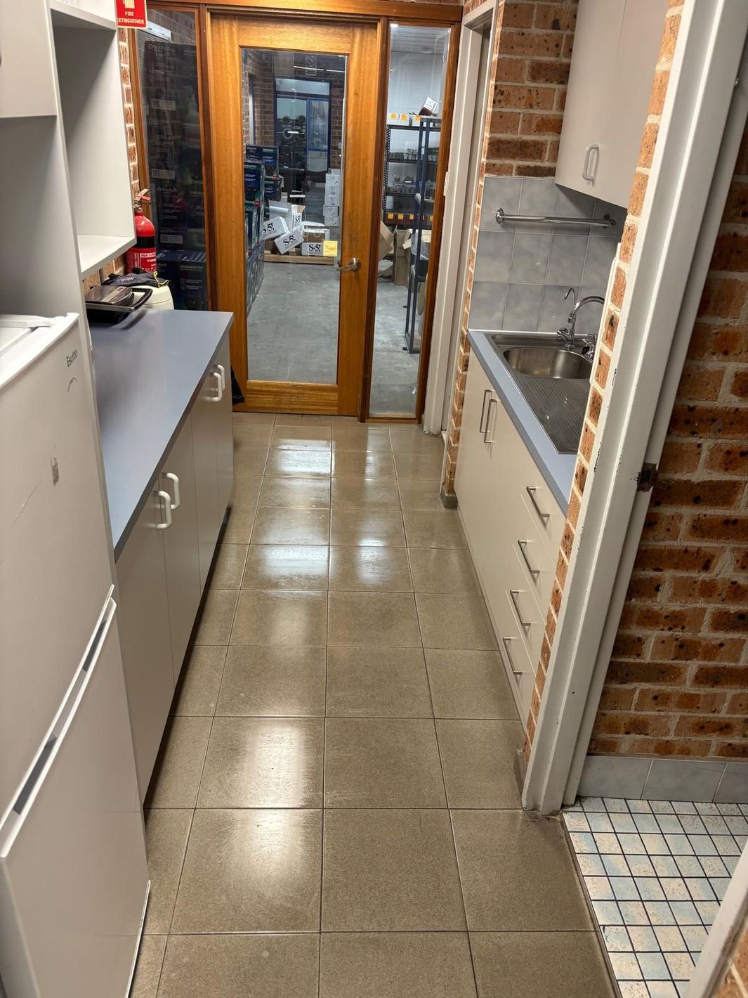  cleaning team conducting routine maintenance clean of commercial facility