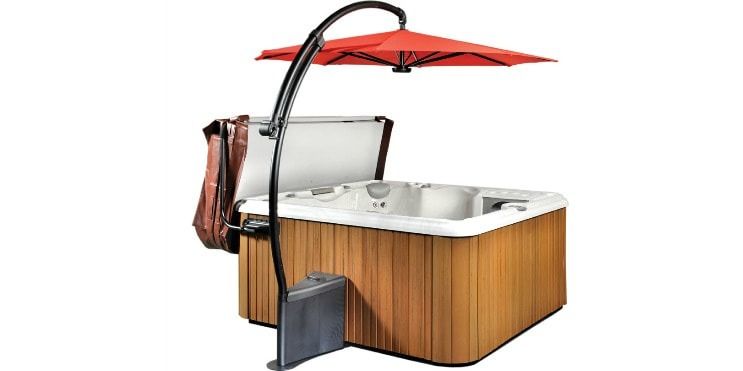 A hot tub with wooden panels, cover, umbrella, and a black support.