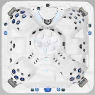 Overhead view of a white hot tub with blue and black jets.