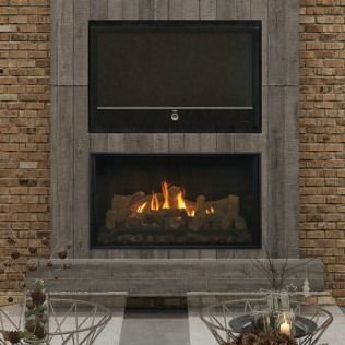 Fireplace with a lit gas fire below a mounted television, framed in gray wood.