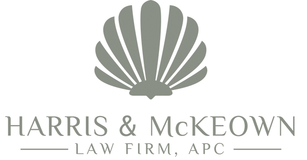 A logo for harris & mckeown law firm , apc