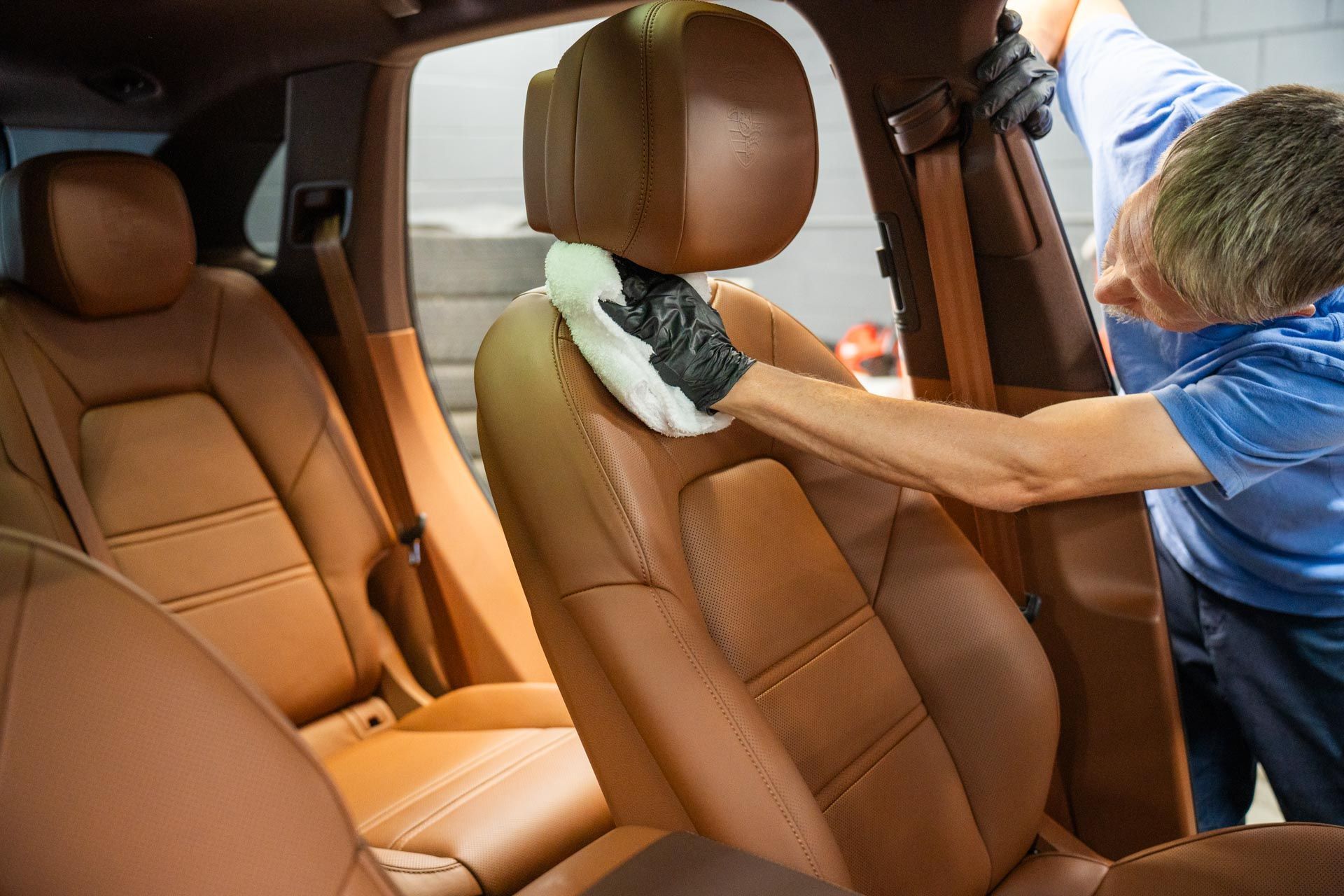 Interior Detailing - Wiping the Leather Seats In Alpine, CA
