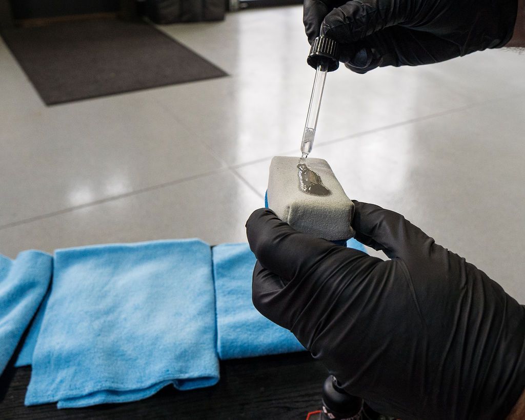 Ceramic Coating - Adding drops of Liquid for Ceramic Coating In Vista, CA