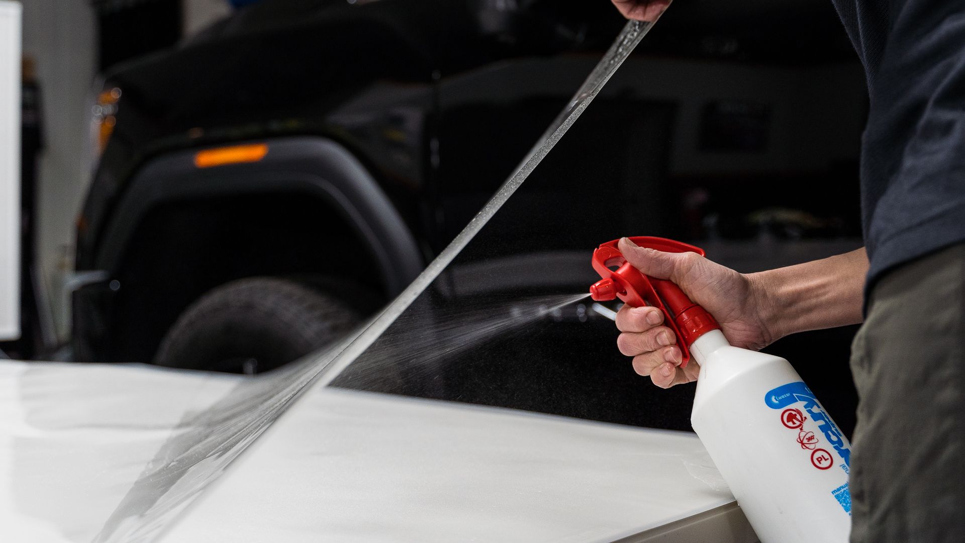 Paint Protection Film - Spraying under the film In Alpine, CA