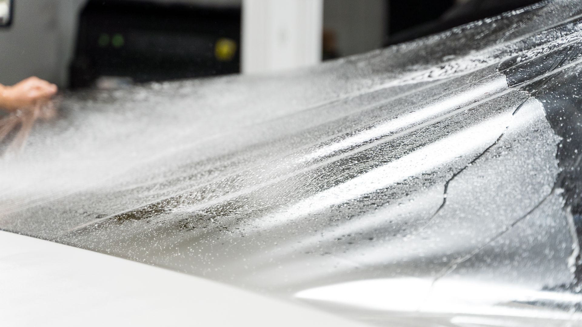 Paint Protection Film - Stretching the Film for the Car In Santee, CA