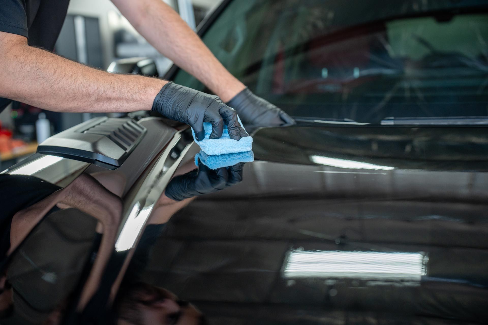 Ceramic Coating - Buffing the Black Car In Vista, CA