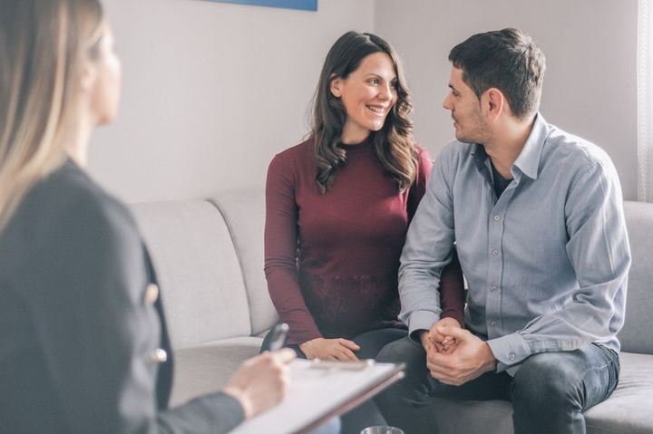 A man and a woman looking at each other