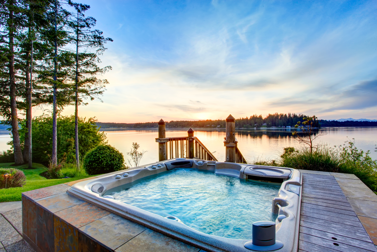 Picture of a concrete deck and border around a hot tub.