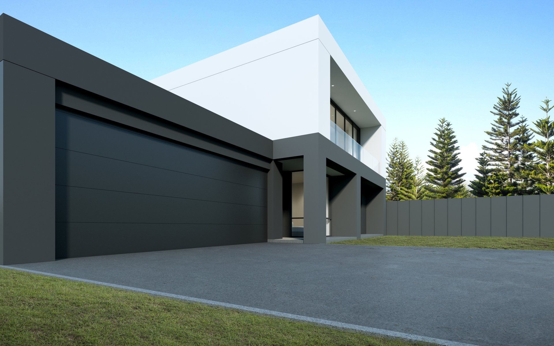 Charcoal-coloured concrete driveway in front of a modern-looking black and white house.