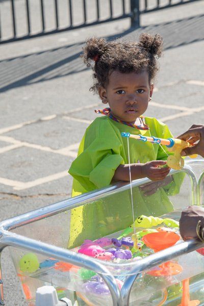 little girl wearing green shirt