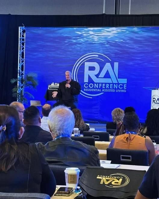 Speaker onstage at RAL Conference