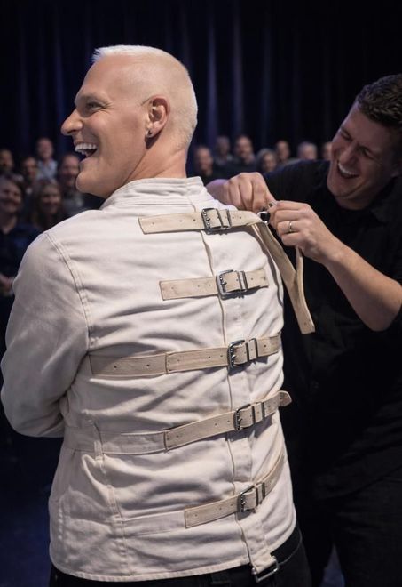 Daniel Bauer in a padded restraint suit
