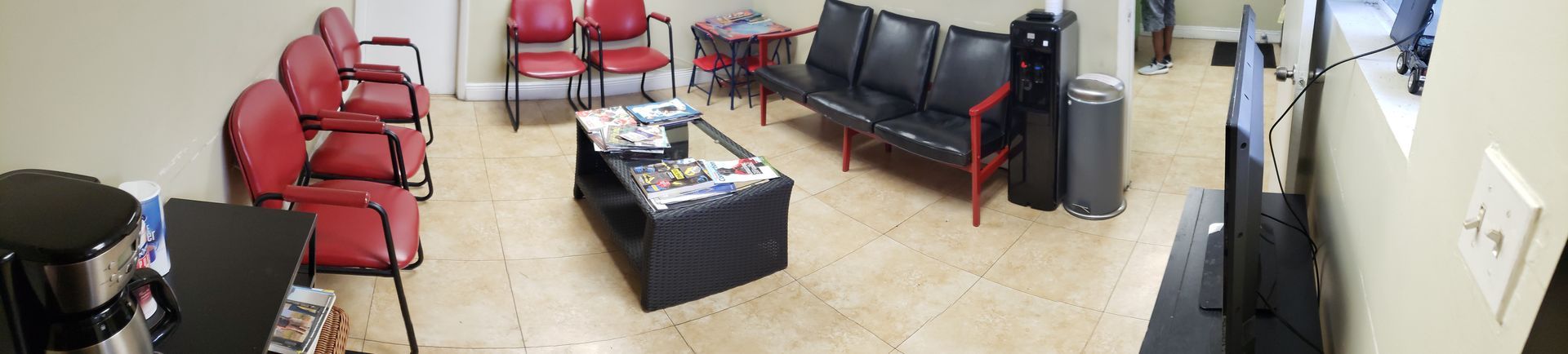 Clean And Comfortable Customer Waiting Area Inside Auto Repair Shop | New Era Automotive