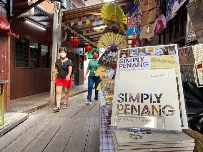 Free gift for direct booking Book your experience directly with us and receive a Penang photo book for free
