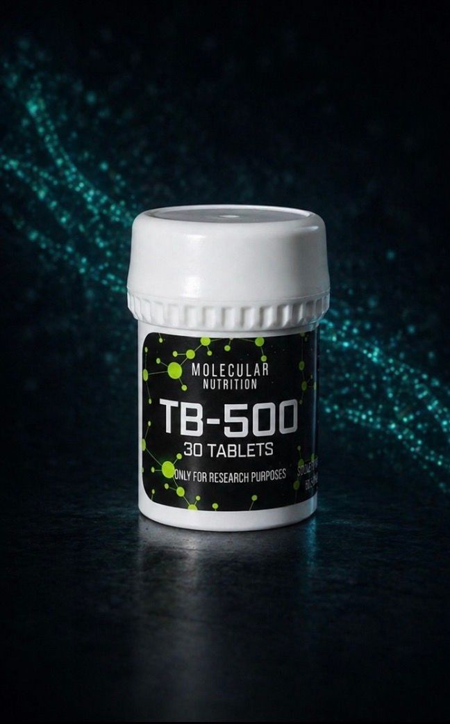 Small white-capped black vial labeled “TB-500” on a dark reflective surface.