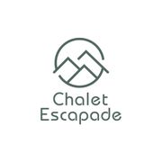 chalet escapade with mountains in a circle.