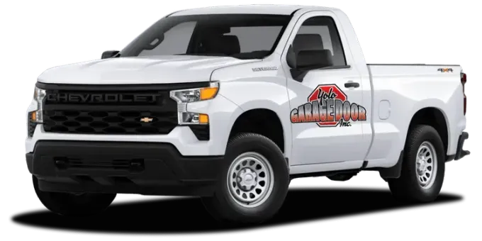 A white chevrolet truck is parked on a white background.