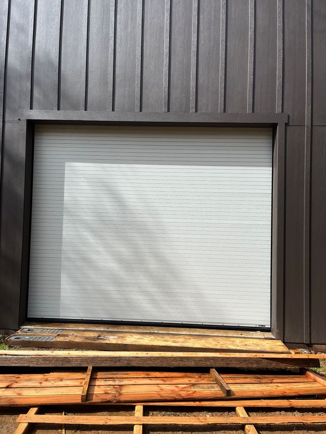 White metal commercial garage door install