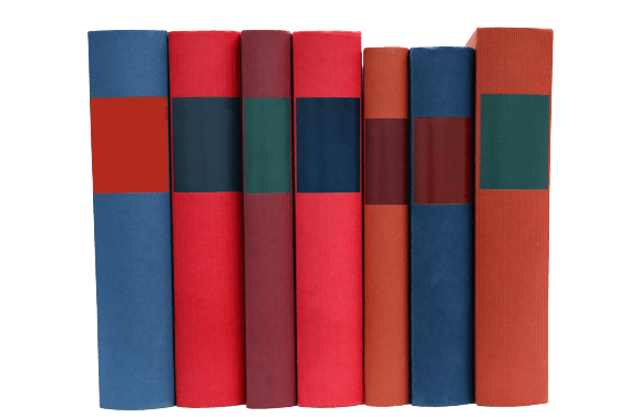 A row of red and blue books are lined up in a row