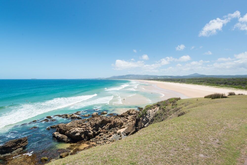 A View of A Beach from A Cliff on A Sunny Day — Custom Cabinetry & Kitchen Renovations in Sawtell, NSW