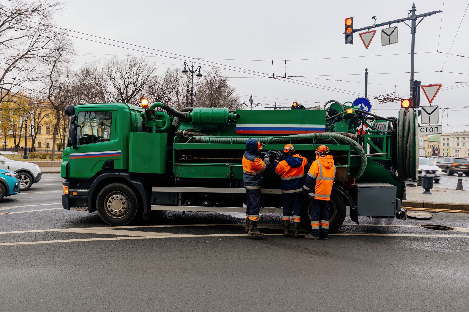 Residential septic pumping truck servicing. Residential septic pumping truck servicing.