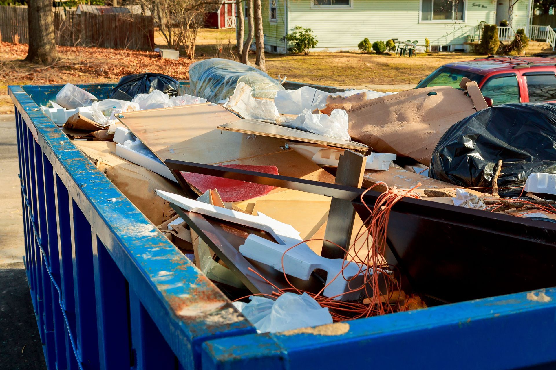 Over flowing dumpsters being full with garbage. Over flowing dumpsters being full with garbage.