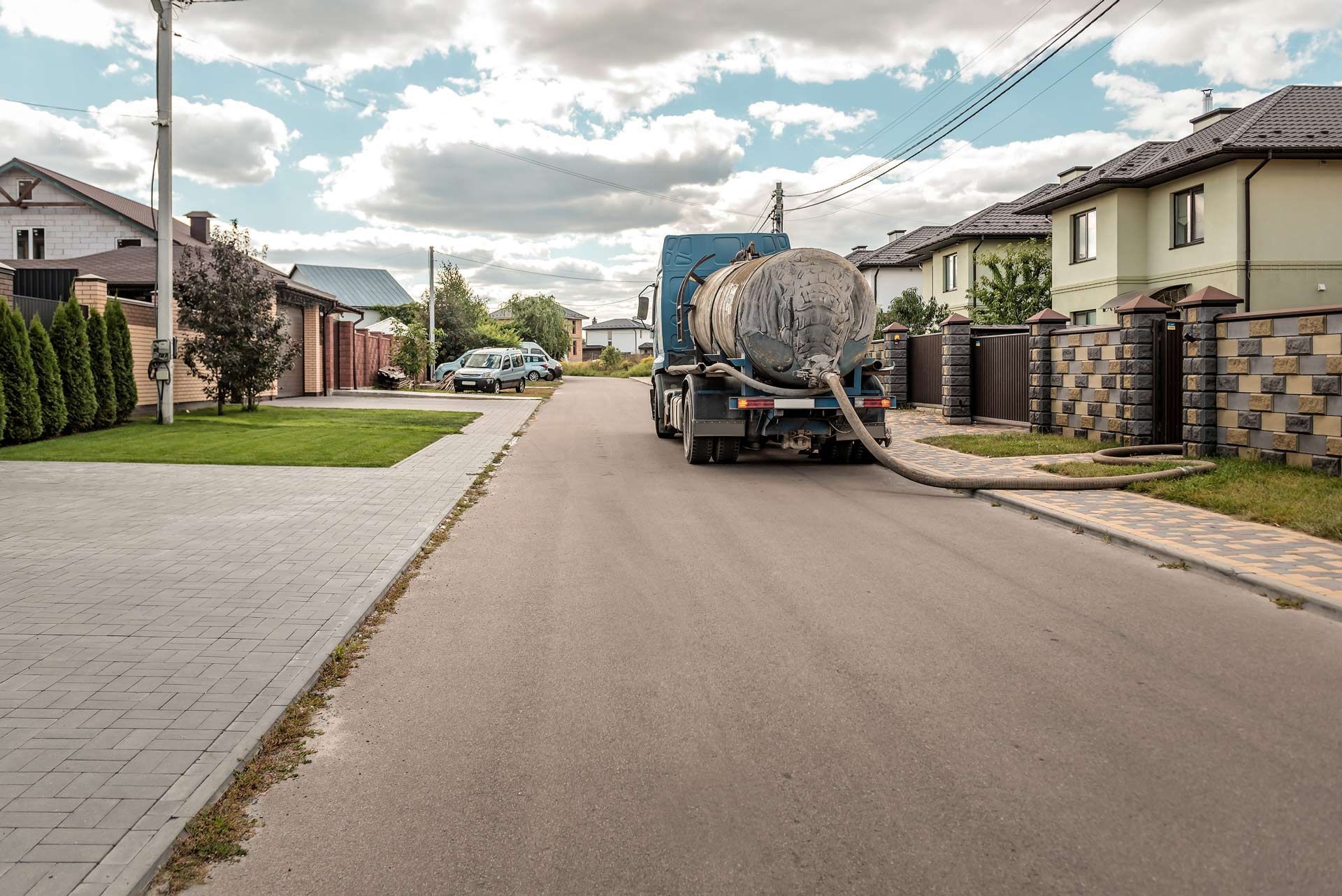 Working sewer pumping machine on the street.