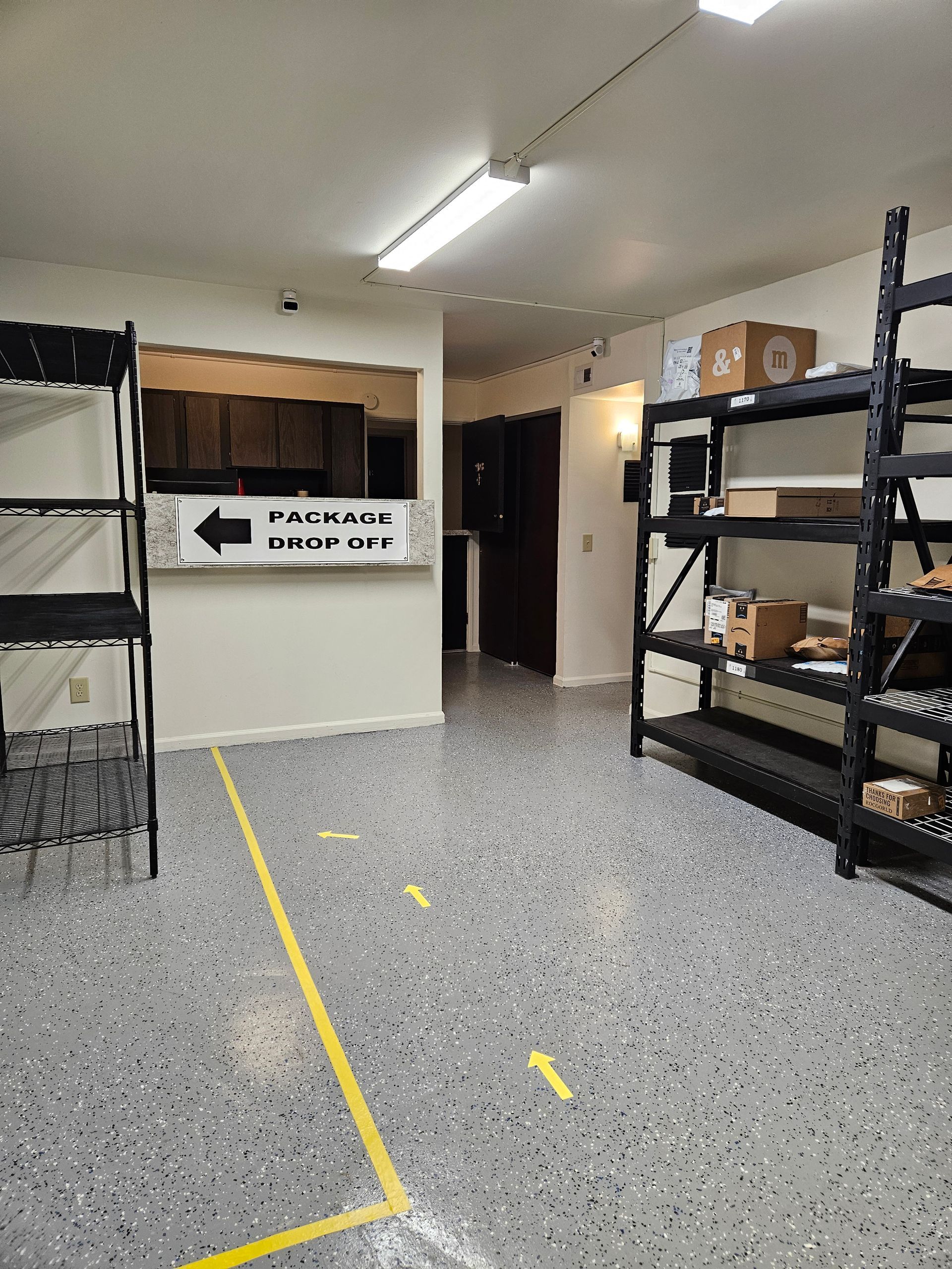 A room with shelves and a sign that says package