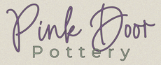 Pink Door Pottery logo in purple script and black lettering on a light background