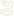 Mostly blank beige image with a small white shape in the lower left corner