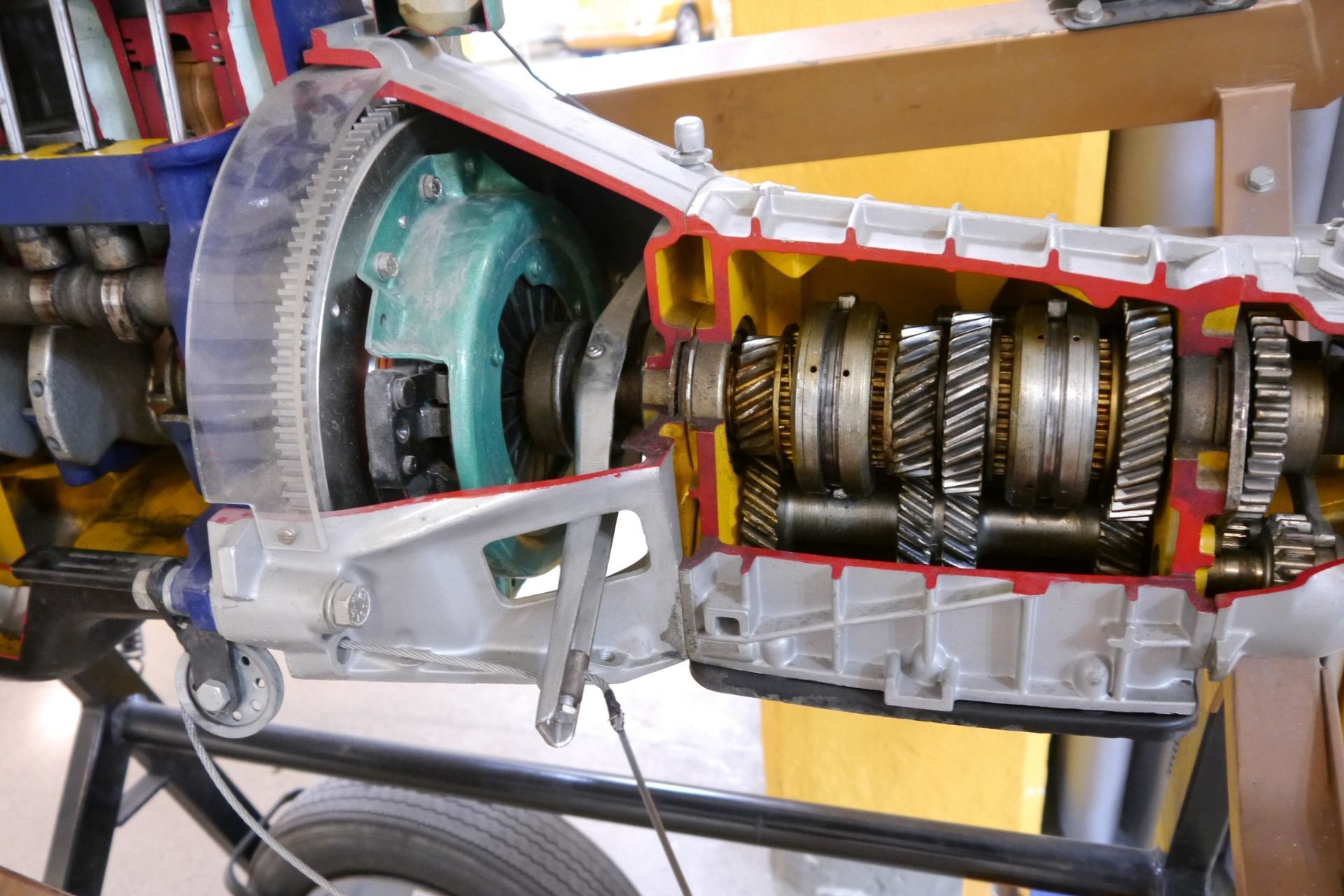 A model of a car transmission is cut in half