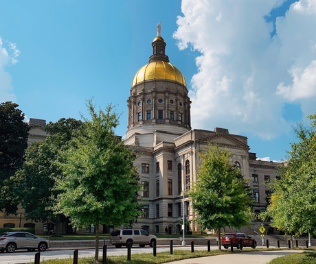 A large building with a gold dome on top of it