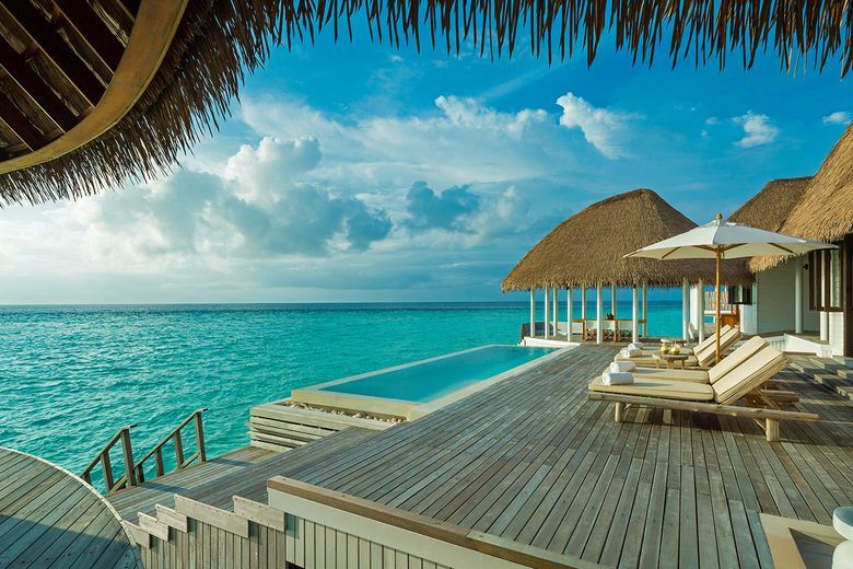 There is a swimming pool in the middle of the ocean.