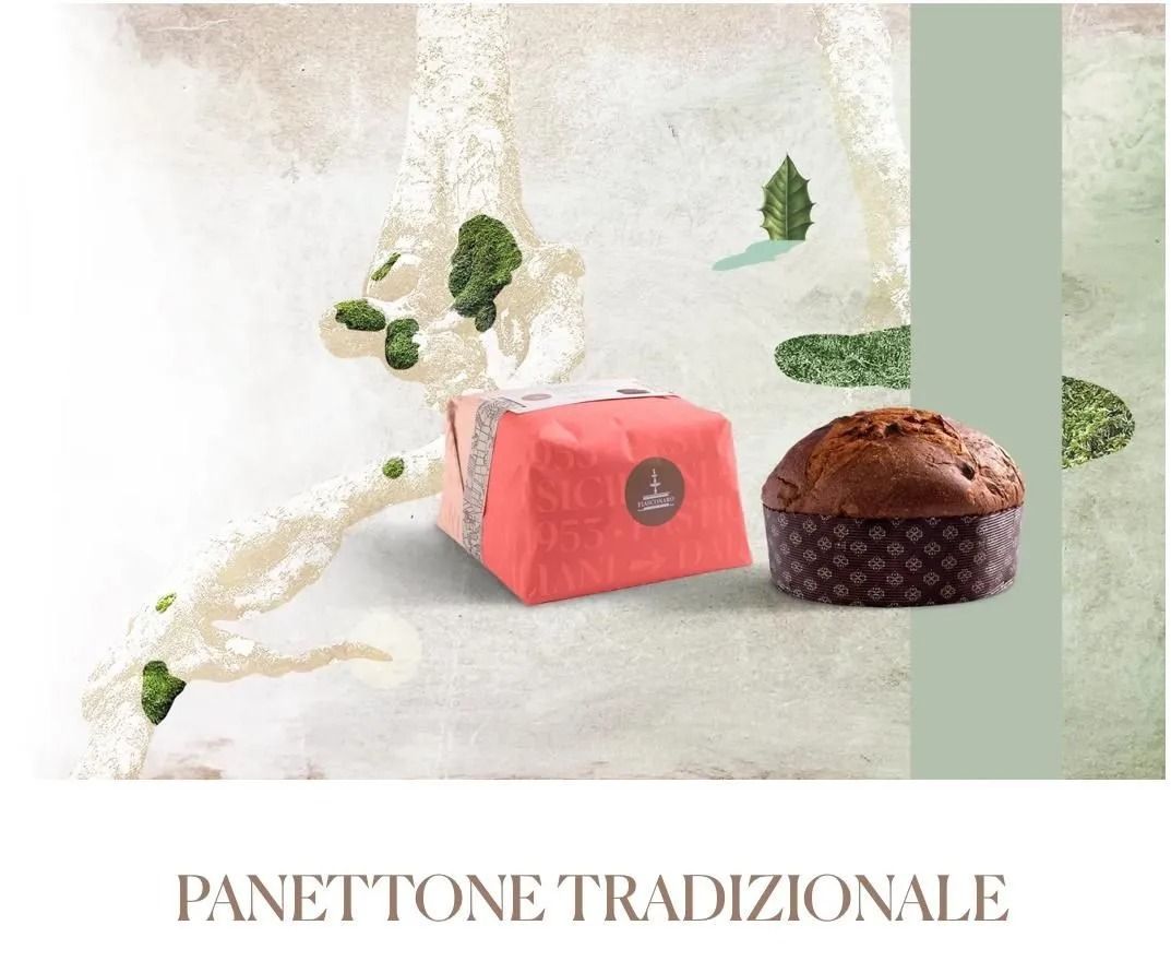 Panettone tradizionale with red gift box and sliced cake on a light background