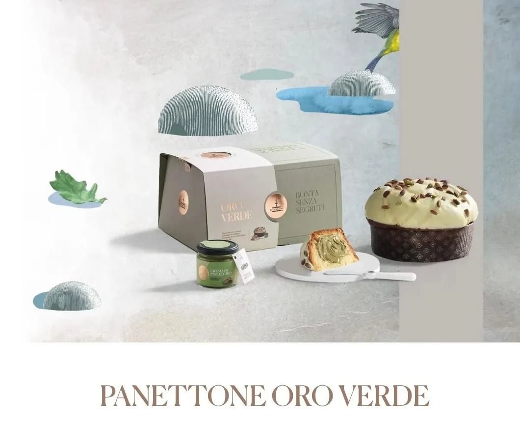 Panettone Oro Verde dessert box with panettone cake, jar, slice, and floating cloud-like accents