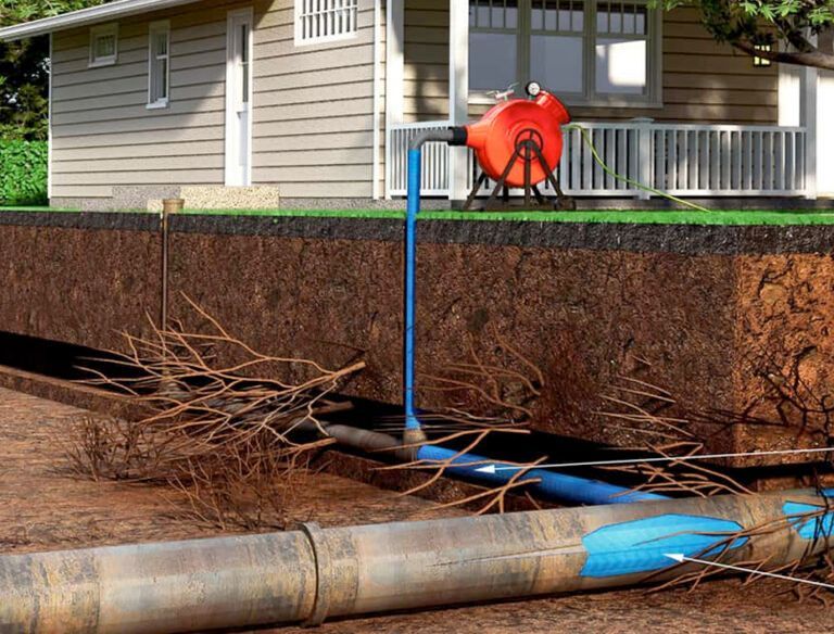 A drawing of a pipe coming out of the ground next to a house.