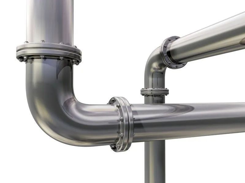 A close up of a stainless steel pipe on a white background.