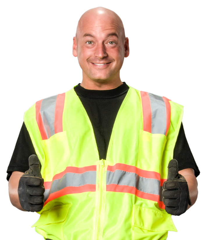 A man wearing a yellow vest is giving a thumbs up