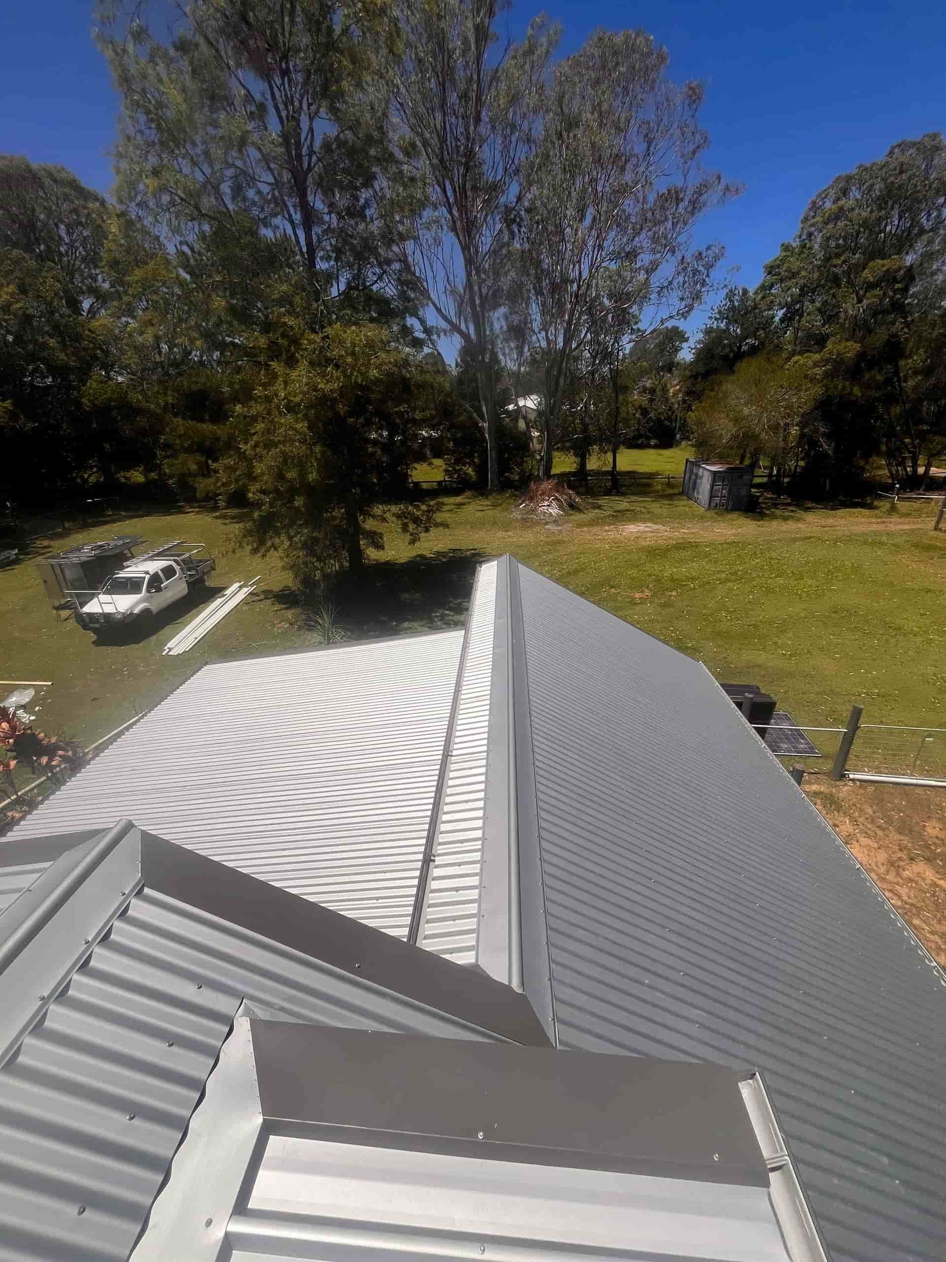 A Wooden Deck With a Window in the Background — Eli Mcauley Constructions in Ballina, NSW