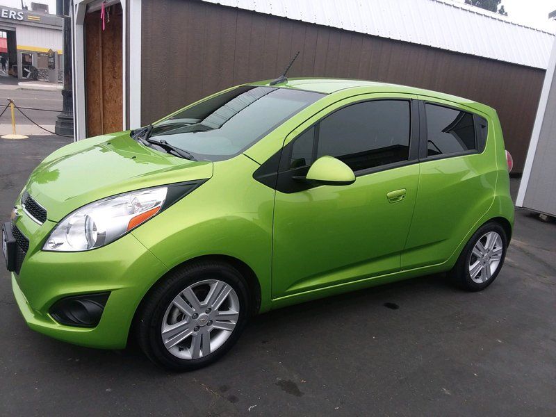 Window Tint In Green Car — Fresno, CA — Precision Window Tinting