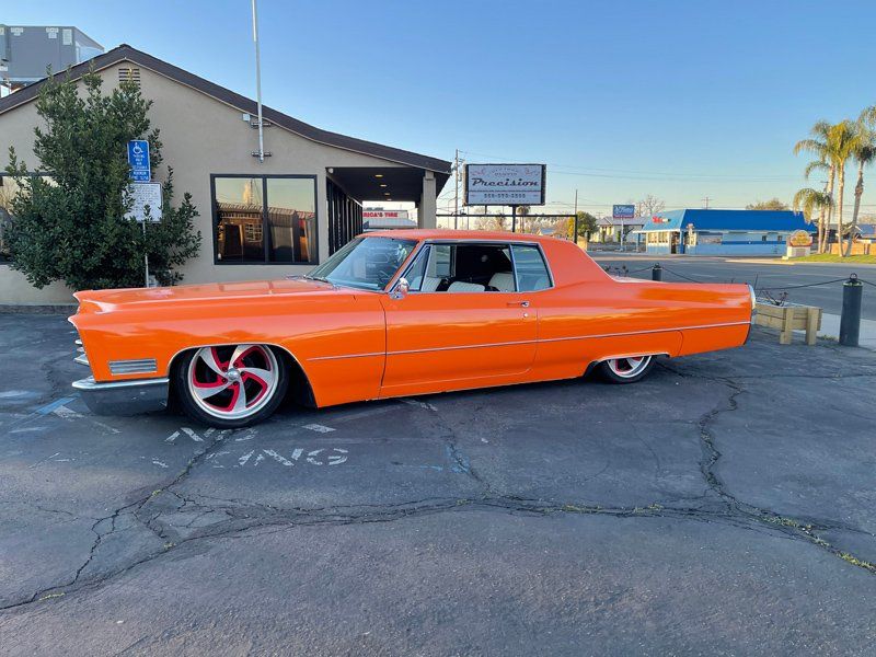 Orange Luxury Car — Fresno, CA — Precision Window Tinting