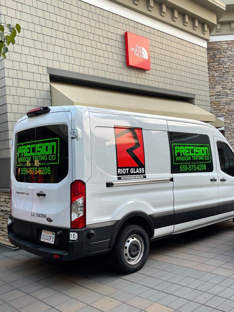 Service Car In Front Of Store — Fresno, CA — Precision Window Tinting