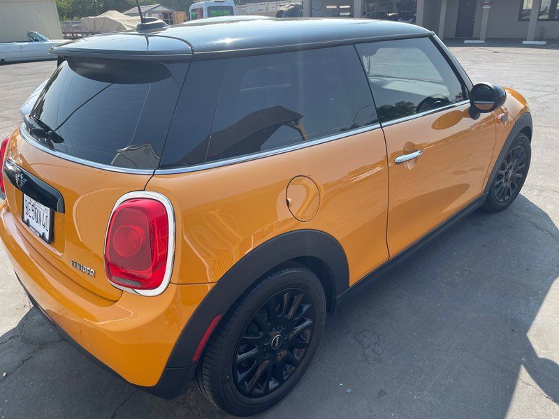 Orange Mini Car — Fresno, CA — Precision Window Tinting
