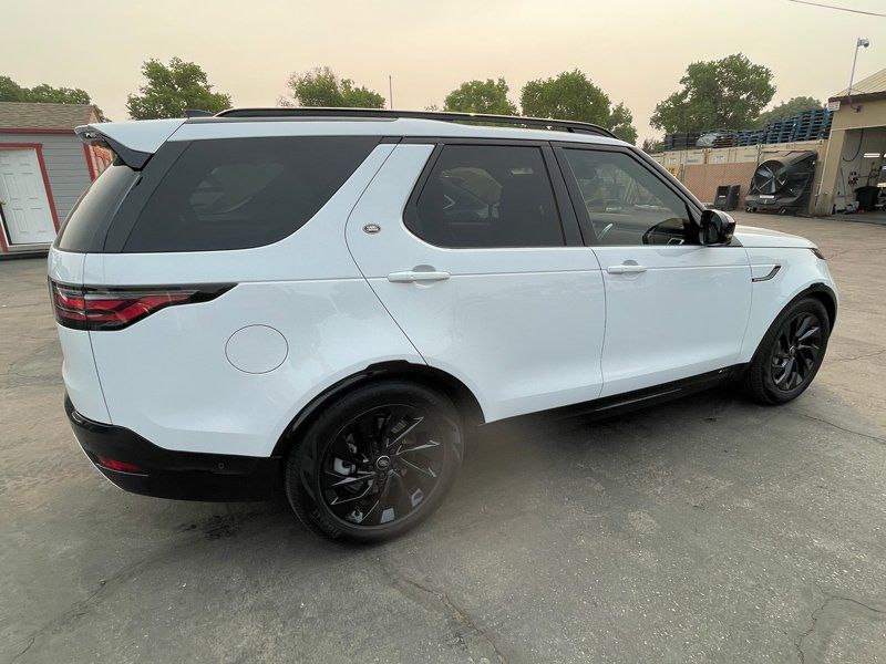 White Luxury Car SUV — Fresno, CA — Precision Window Tinting