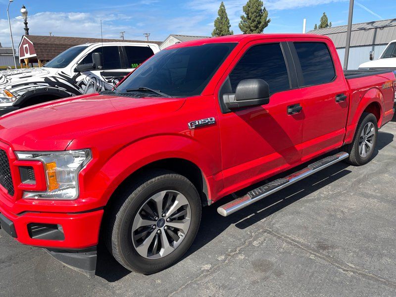 Red Car With New Window Tint — Fresno, CA — Precision Window Tinting