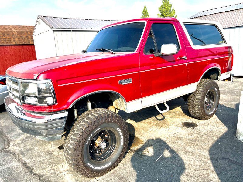 Bright Red Car — Fresno, CA — Precision Window Tinting