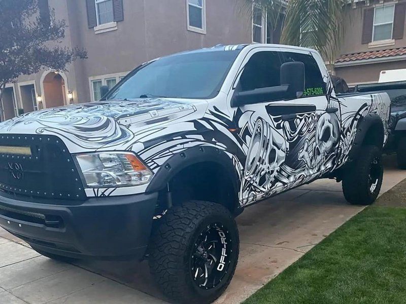 Artworks In Car — Fresno, CA — Precision Window Tinting