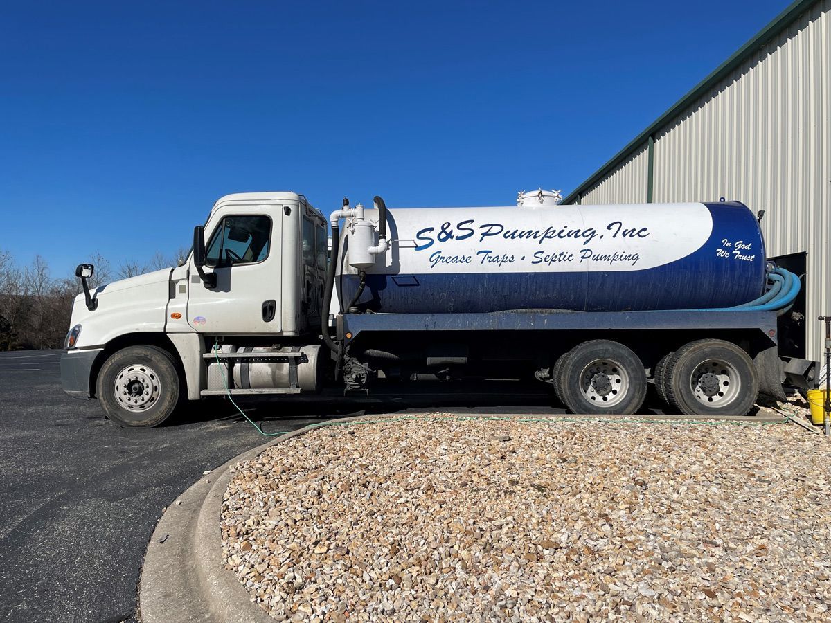 Side view of a sewage tank truck — Branson, MO — S & S Pumping, Inc.