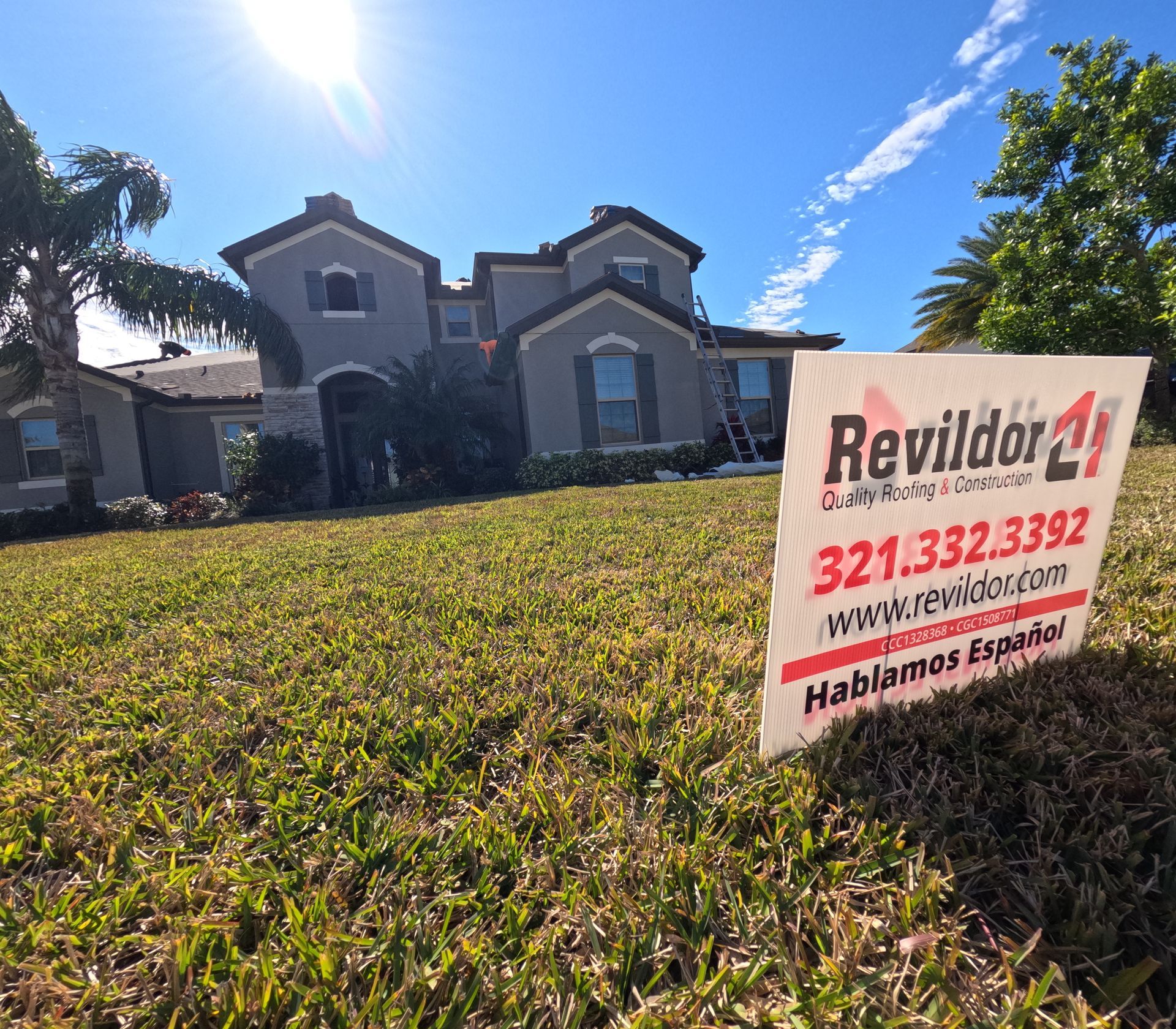 Revildor roofing project in Central Florida with professional roofing company vehicle